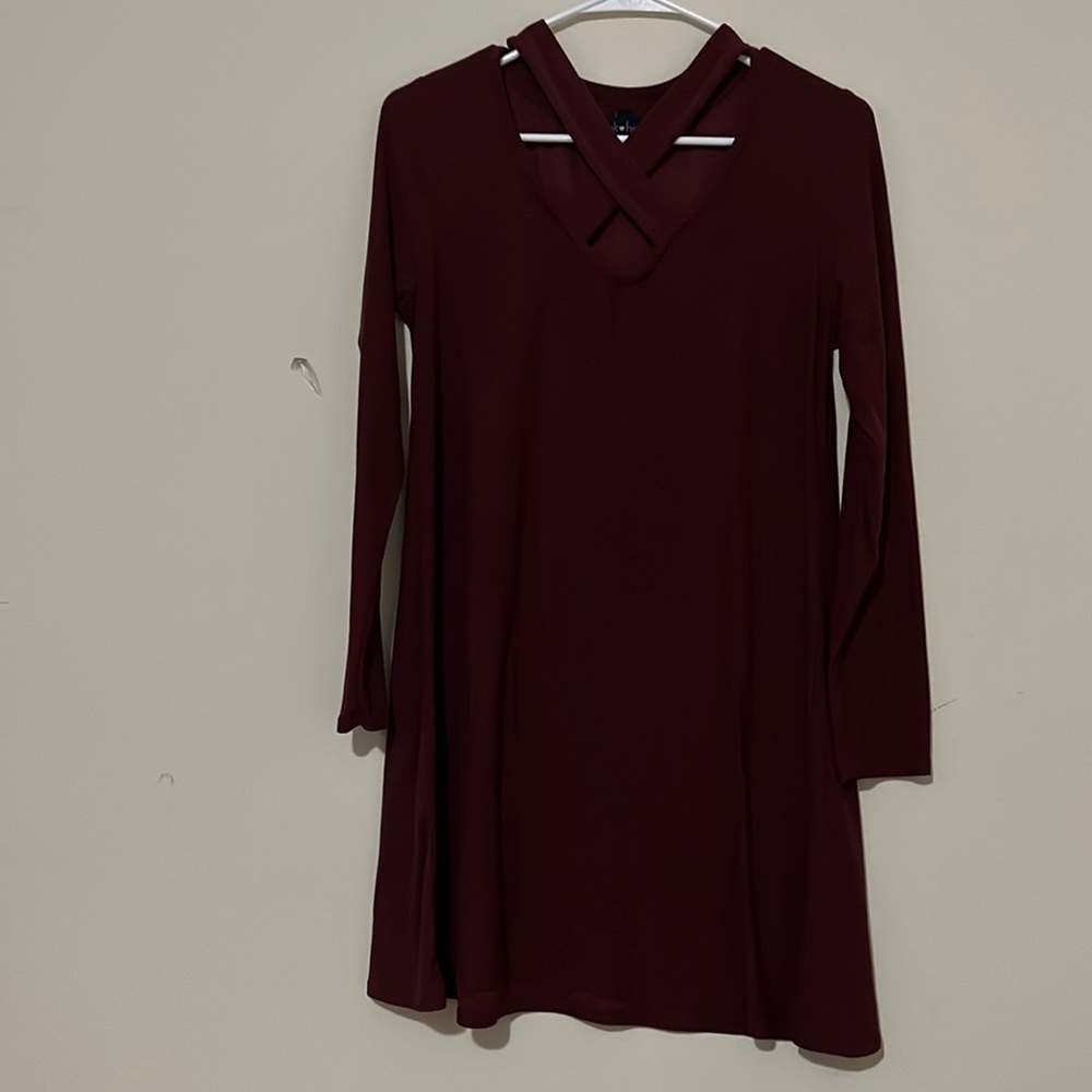 Maroon colored dress with cross neck detail
